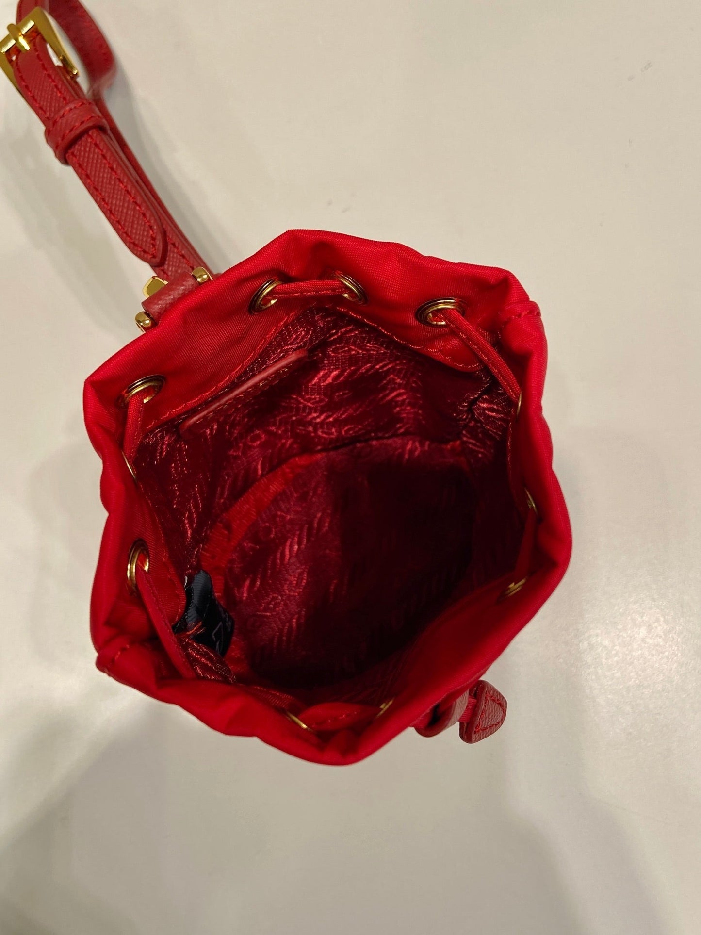 MINI BUCKET BAG 10 IN RED RE-NYLON AND SAFFIANO LEATHER STRAP mysite