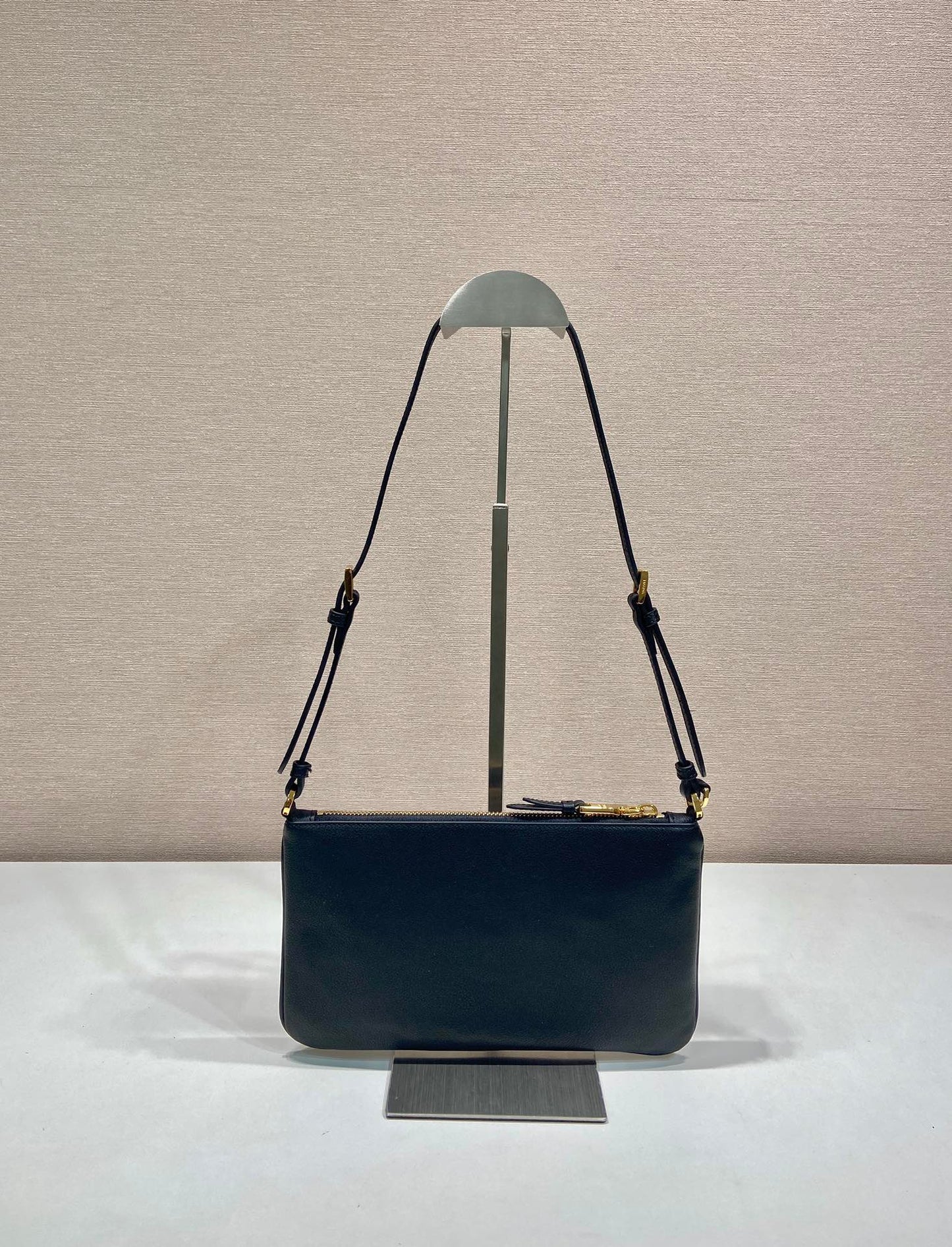 TRIANGLE LOGO SHOULDER BAG 24 IN BLACK SMOOTH CALFSKIN mysite