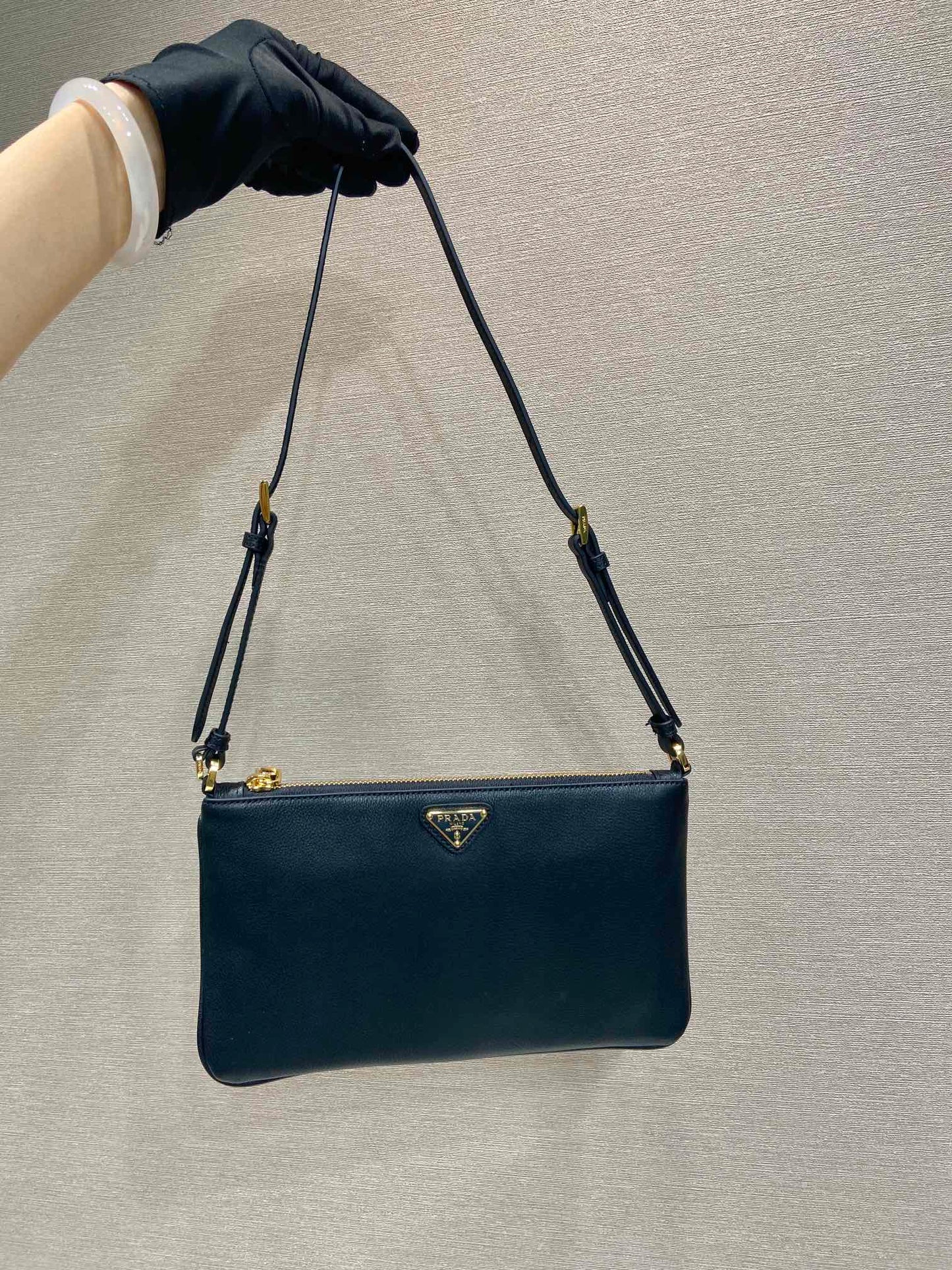 TRIANGLE LOGO SHOULDER BAG 24 IN BLACK SMOOTH CALFSKIN mysite