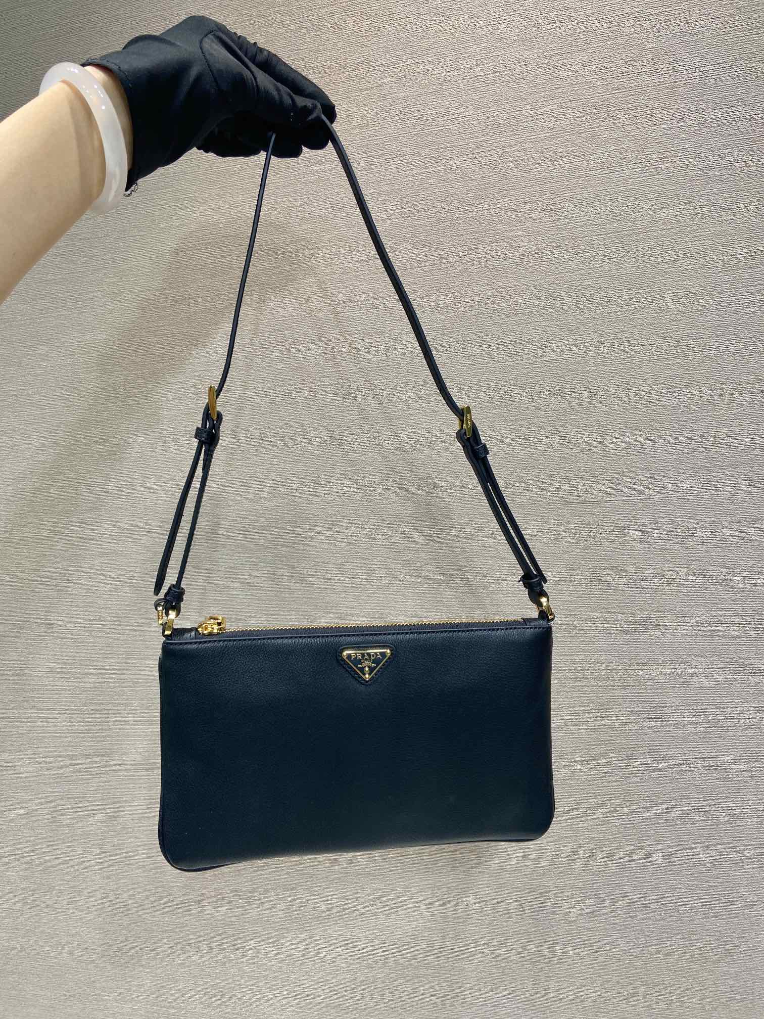 TRIANGLE LOGO SHOULDER BAG 24 IN BLACK SMOOTH CALFSKIN mysite