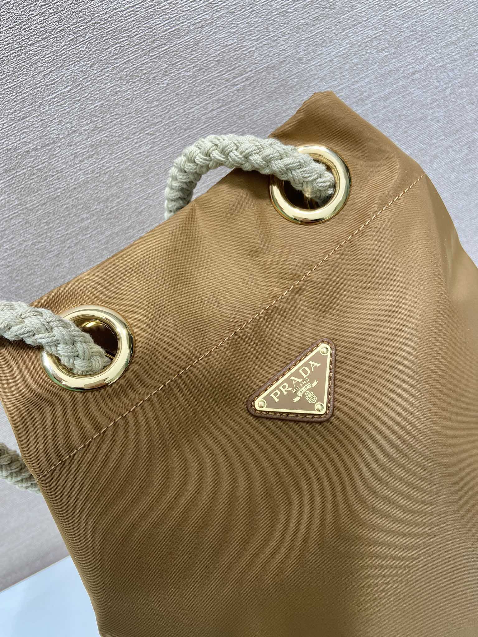 BUCKET BAG 28 IN SEPIA BROWN RE-NYLON GOLD LOGO mysite