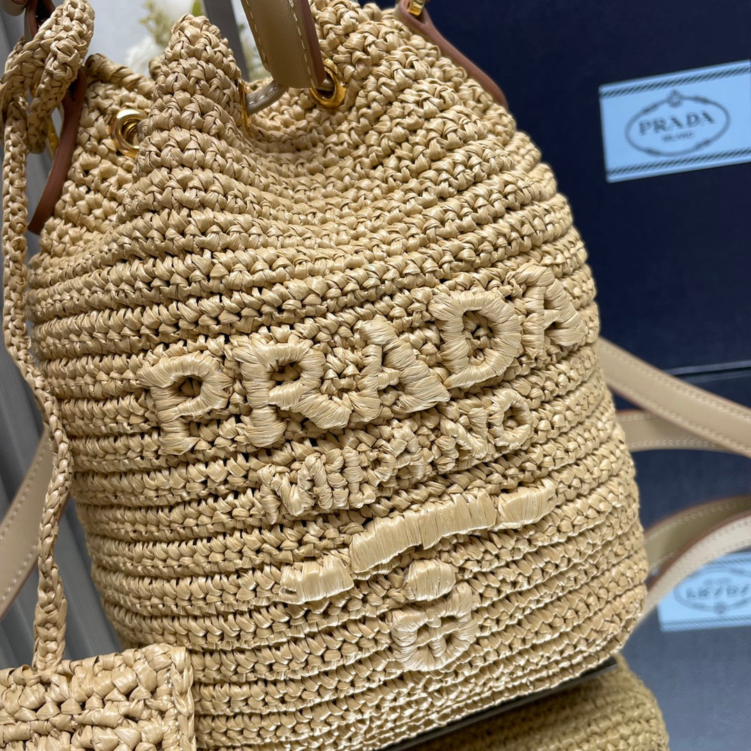 BUCKET BAG 20 IN BEIGE WOVEN RAFFIA EMBOSSED LOGO mysite