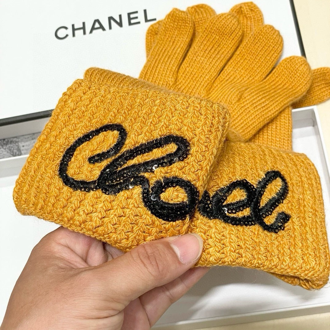 GLOVES IN MUSTARD YELLOW WOOL WITH BLACK LOGO 465776 mysite